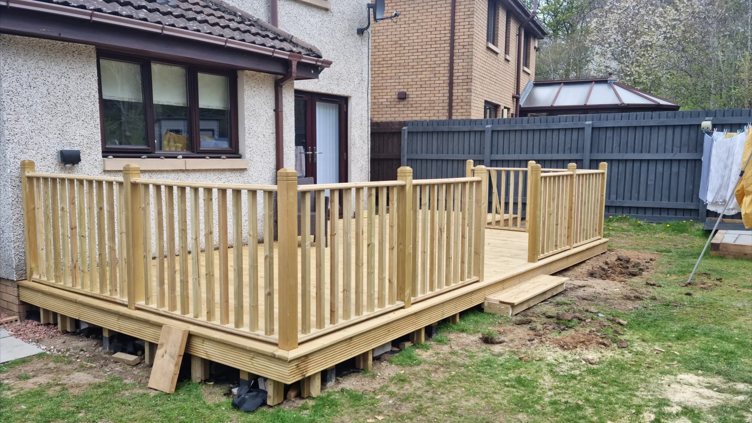 Raised timber decking with spindle balustrade